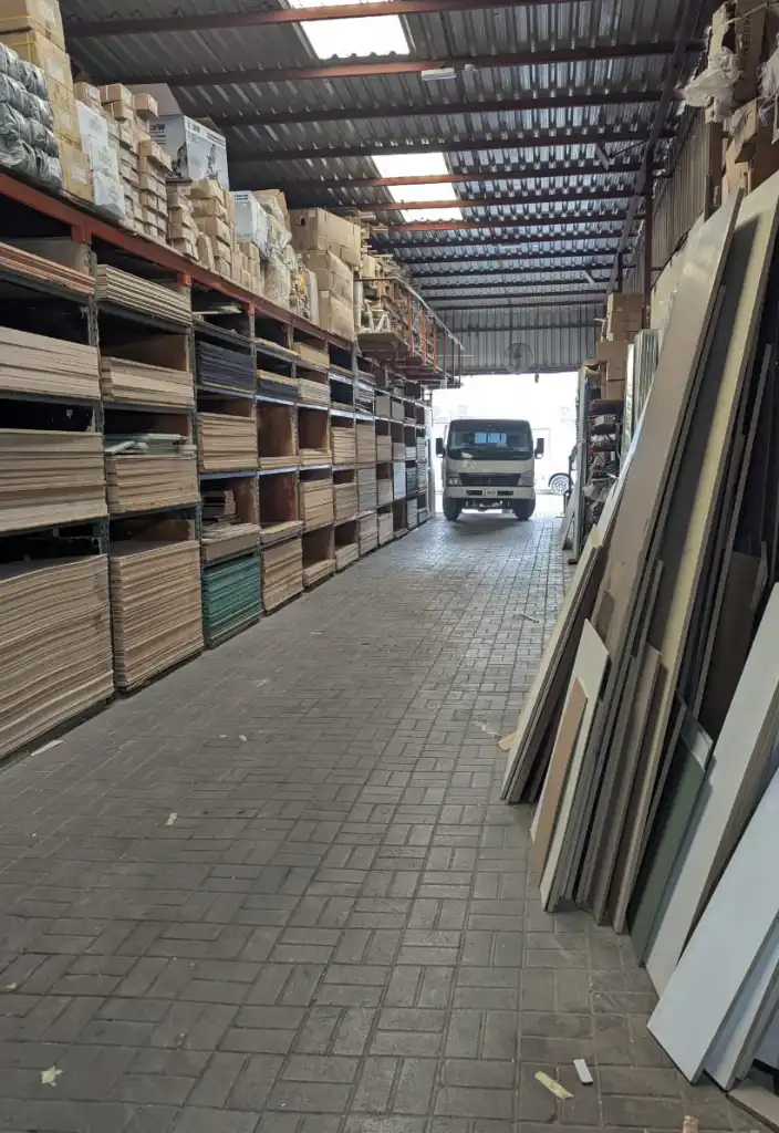 Premium wood carpentry materials featuring MDF sheets and plywood for expert furniture assembly in Dubai